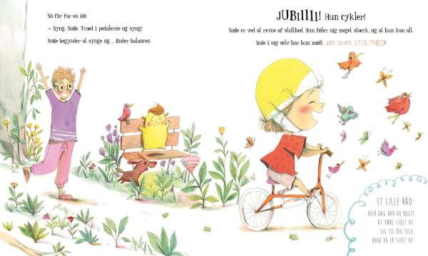 Opslag fra Min store bog om følelser med illustration af barn på cykel – pædagogisk bog om følelser


