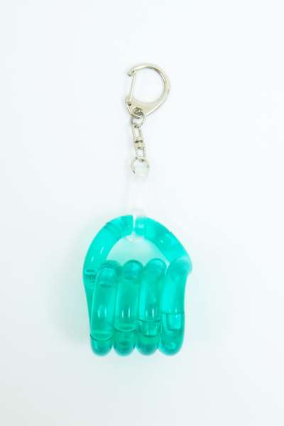 Tangle Classics Jr. Jelly nøglering vist foldet, med lilla fleksible led og fastgjort til metalring