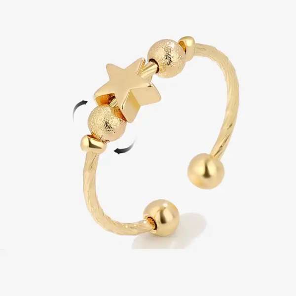  Anxiety ring guld med stjerne og perler – close-up af design

