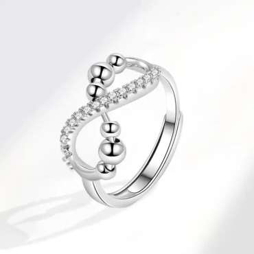 Anxiety ring Infinity i sølvfarve – justerbar ring med uendelighedssymbol og perler

