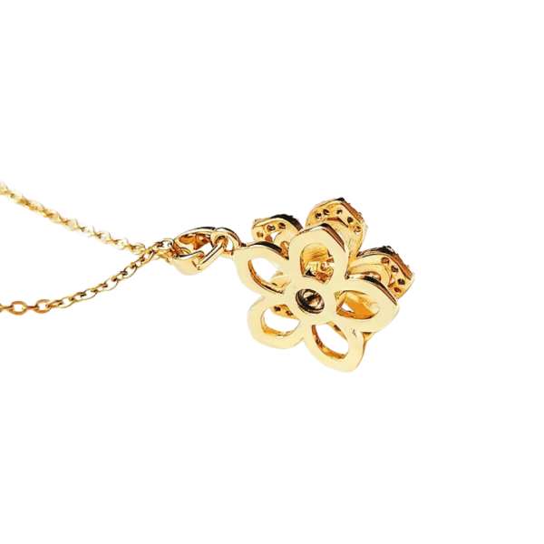 Fidget halskæde zirkonblomst bagfra – elegant guldfarvet design

