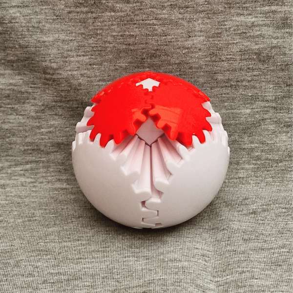 Morphing Gear Ball hvid – mekanisk fidget bold til sanselig stimulering

