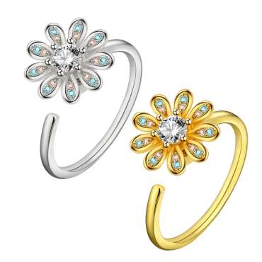 
Fidgetring med blomst – ringe i guld og sølv med blomsterdesign

