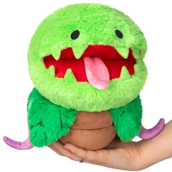Venus fluefanger plush bamse holdt i hånd – grøn kawaii plante med tænder, tunge og blødt design


