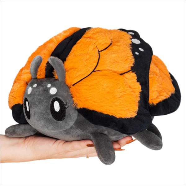 Monark sommerfugl plush bamse holdt i hånd – orange og sort kawaii sommerfugl med bløde vinger

