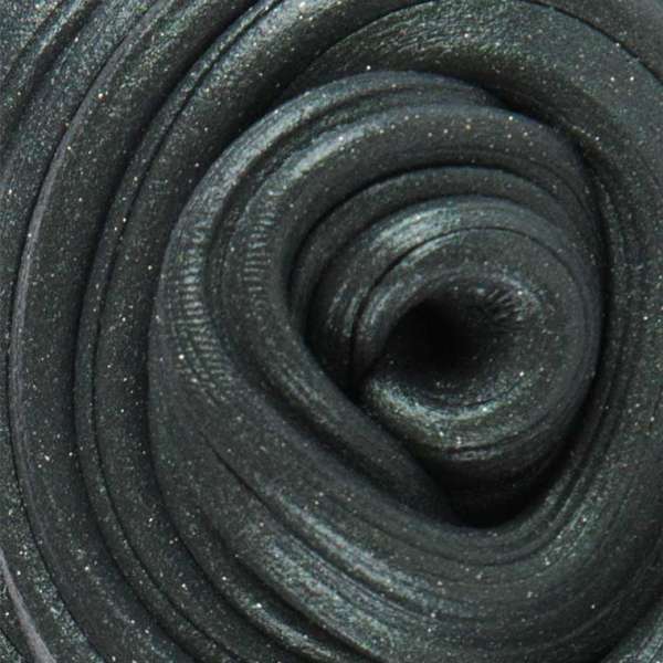 Magnetisk Thinking Putty close-up – sort putty der reagerer på magneter

