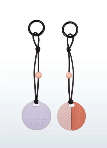 CalmCircle lyse farver close-up – taktilt fidget og tyggeredskab med struktur


