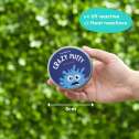 Hånd holder dåse med farveskiftende putty der reagerer på varme og UV lys – kreativt legetøj til børn


