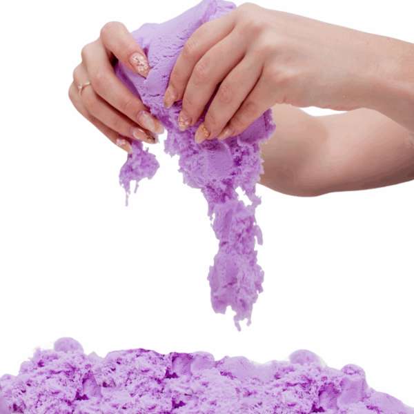 Lilla Magic Sand, der formes mellem hænderne – sansesand til taktil stimulering, afslapning og kreativ leg.