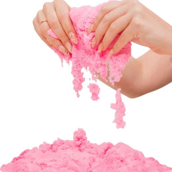 Pink Magic Sand, der flyder mellem hænderne – sansestimulerende legesand til kreativ udfoldelse og taktil stimulering.