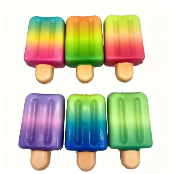 Squishy regnbue ispinde i seks forskellige farvekombinationer – bløde slow-rise squishies til taktil stimulering, afslapning og sanselig leg.
