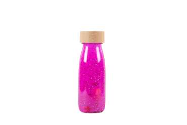 Petit Boum Float sanseflaske i pink med glimmer og dekorative elementer samt træfarvet låg på hvid baggrund.